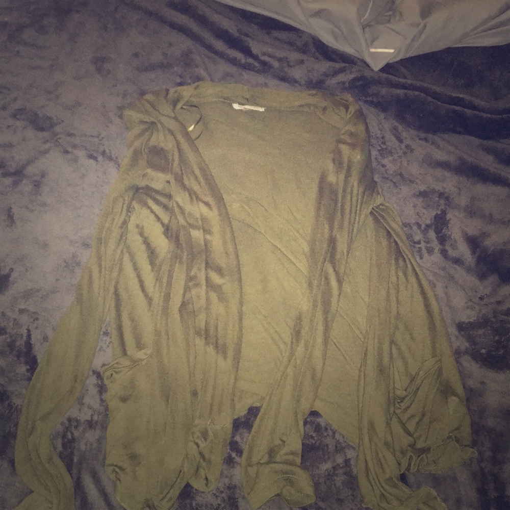 Dark green throw over sweater